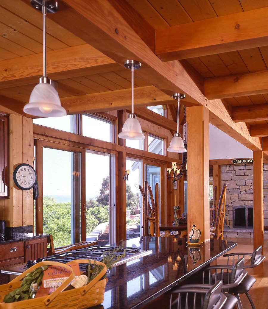 Post and beam kitchen with view of ocean