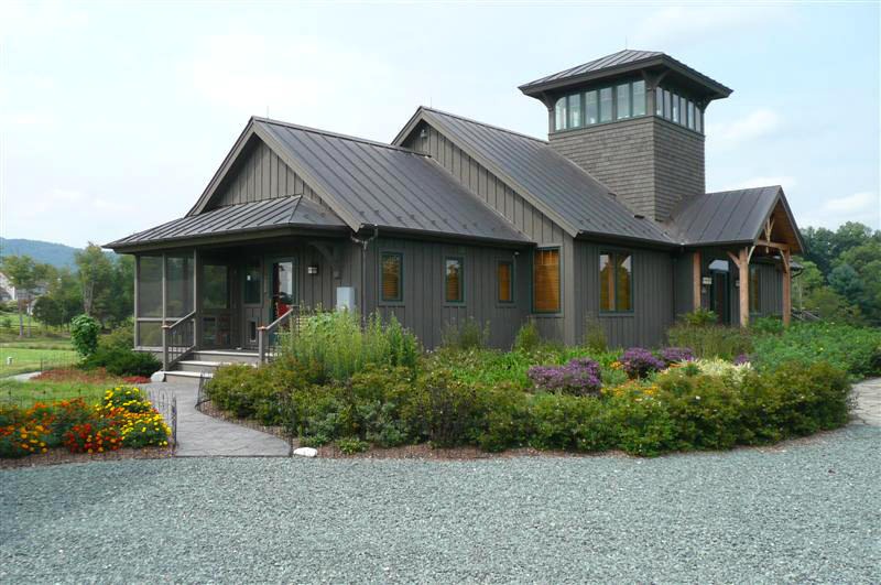 modern style barn home with large cupola