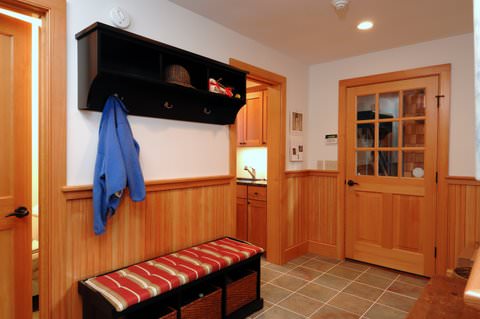 tiled mudroom in post and beam lake house