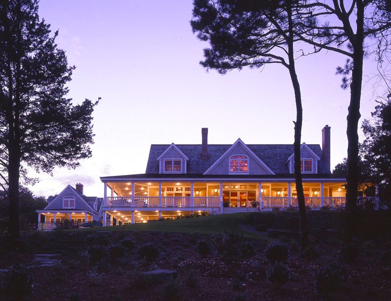 cape cod home at sunset 