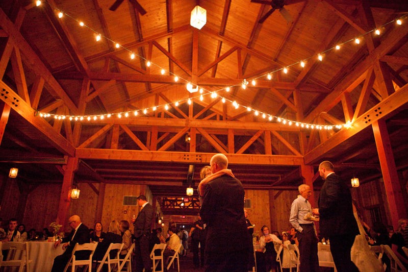 barn wedding dancing under lights