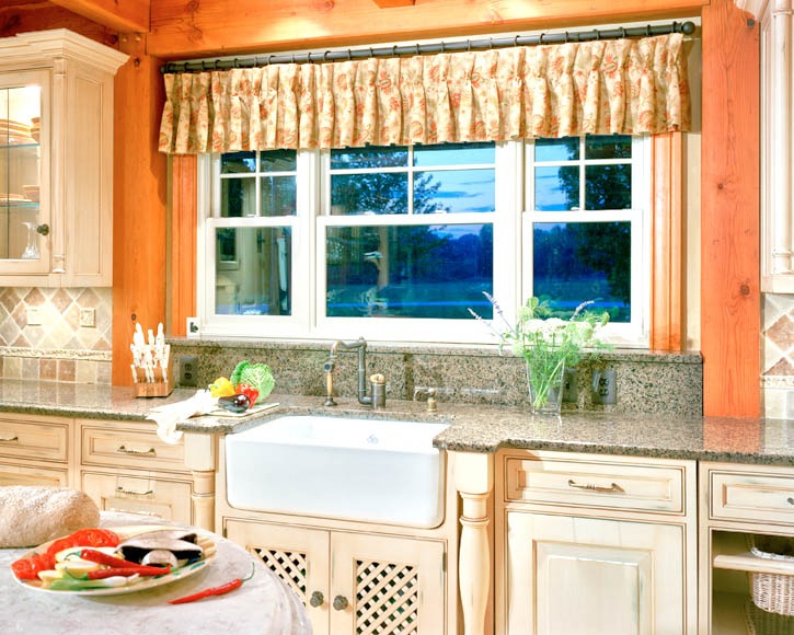 post and beam kitchen with farm sink