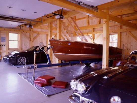 Garage Barn 5857 interior with two cars and boat