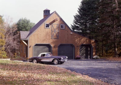 Garage Barn (5857) exterior with chevy and garage doors closed