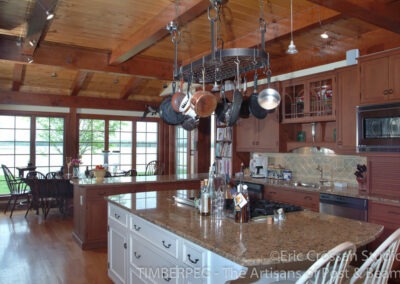 Chestertown, MD (4154) kitchen with large island with grill range and dining room beyond