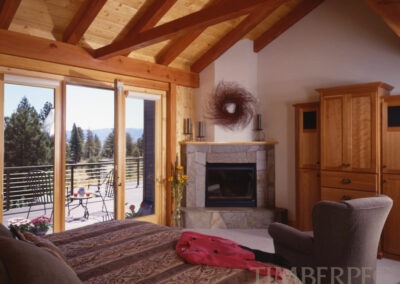 Reno, NV (4456) bedroom with timber frame and fireplace