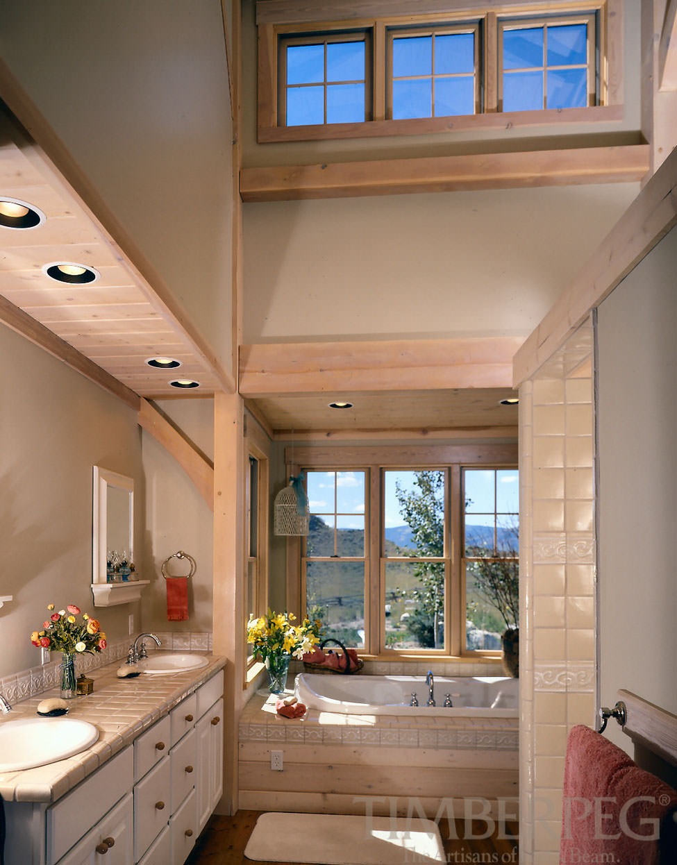 Granby, CO (4921) bathroom with bathtub surrounded by windows and views of the mountains
