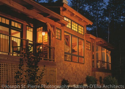 Intervale Pond Home Sandwich NH (5105) exterior view at night of house lit