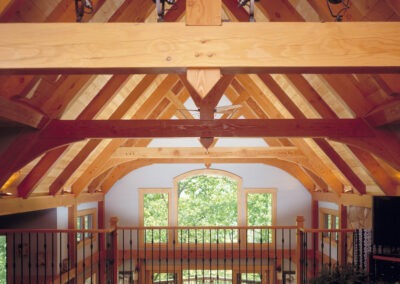Mills River, NC (6049) loft bedroom view featuring timber frame cathedral ceiling