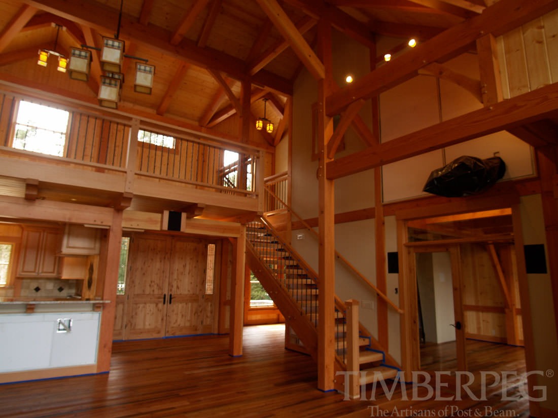 The Fiddle Creek (T00419) great room and staircase up to loft construction