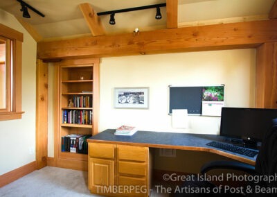 Grafton Lake House (T00502) office off of the loft with built in bookcase and large timber frame