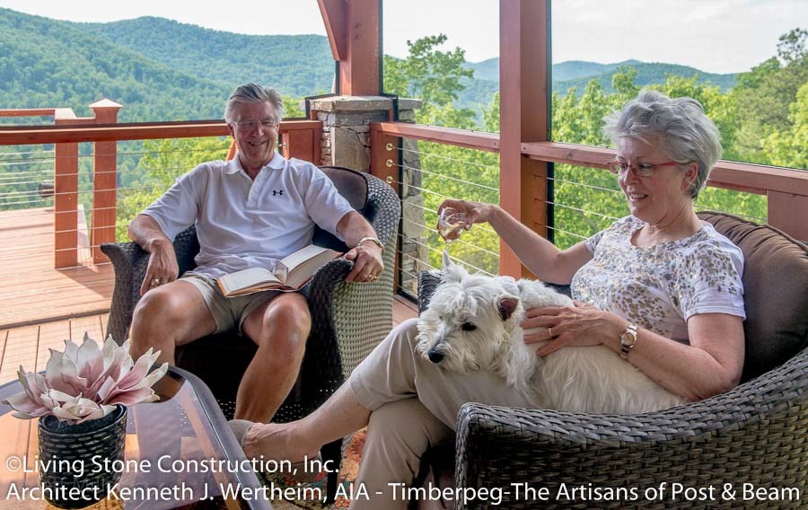 Arden, NC (T00791) owners and dog sitting on covered deck