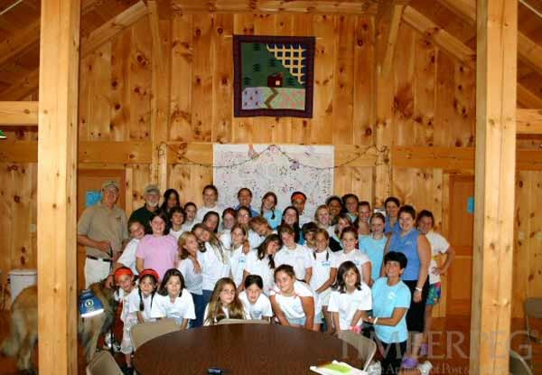 Circle Camp, Spectacle Pond, NH (5746) room with campers and counselors gathered