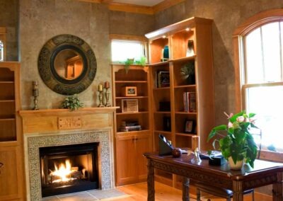 Normandy Glenn, NC (5787) office featuring bookshelves and fireplace