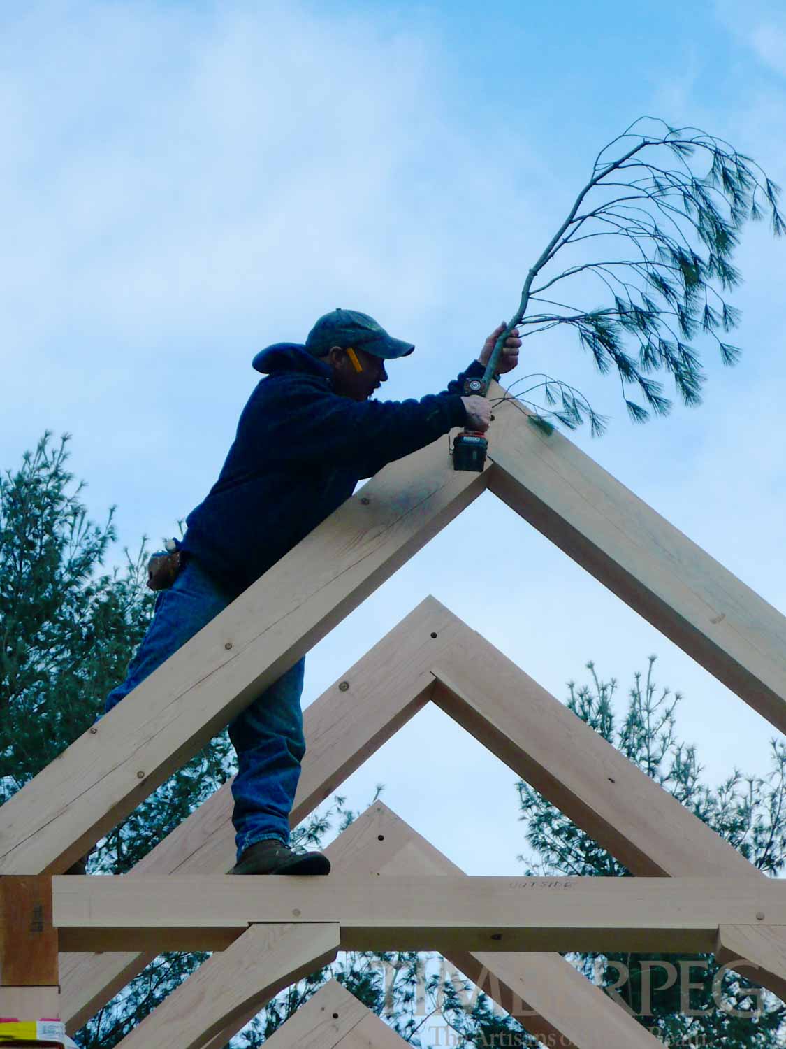 Arts & Crafts timber frame construction topping ceremony