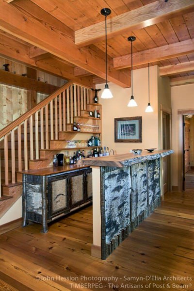 birch bark bar with staircase behind it