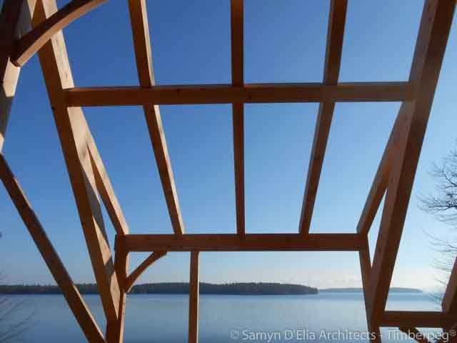 Gilford, NH (T00733) construction of timber frame and view over water