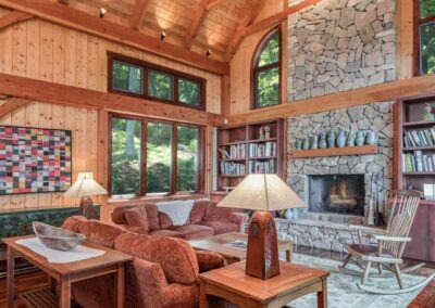 Leconte, Asheville, NC (5607) view of great room featuring stone fireplace and cathedral ceiling