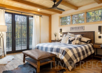 Ludlow, Vermont Ski Home bedroom with door out to deck