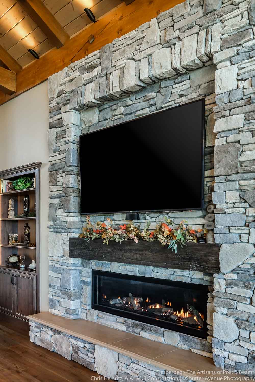 Meadow Vista CA T01033/T01111 living room stone fireplace with flat screen television