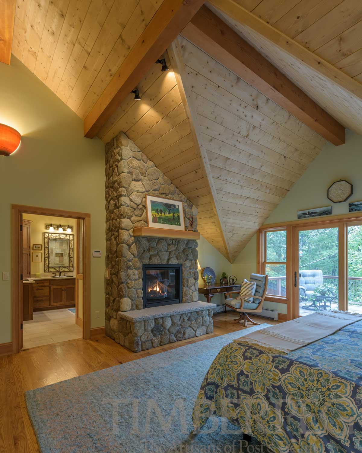 South Sutton, NH (T01212) bedroom with irregular ceiling and stone fireplace
