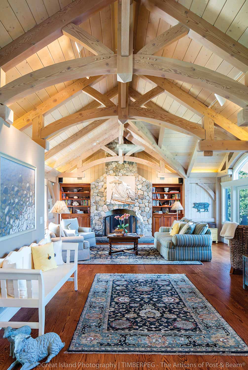 Aquinnah Martha's Vineyard, MA (5806) great room with large stone fireplace and curved trusses