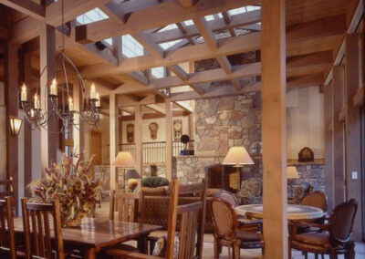 Vail Co 3417 interior with large timber frame and massive stone fireplace