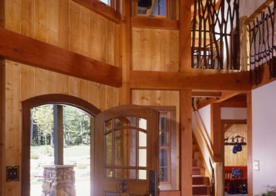Berkshires entryway with cathedral ceiling and loft