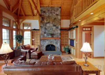 Harrisville (5447) great room with cathedral ceiling and stone fireplace