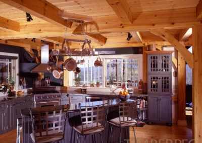 Lake Lure (5469) view of kitchen with hanging pots and pans, island with bar seating