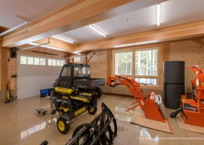 Party Barn and Guest House garage holding heavy equipment