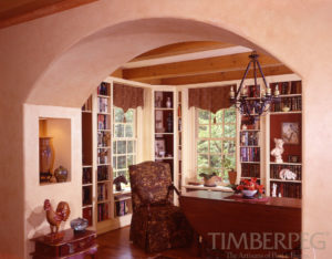 Charlottesville VA (5472) view into library with beams across ceiling, built in bookshelves and large, archway